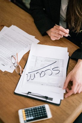 person working on a tax form